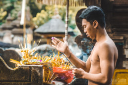 Man praying, Tirta Empul Tampak Siring - Bali Holy Spring Water Temple